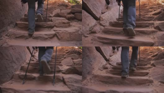 女人的脚艰难地攀登红色峡谷的石阶高清在线视频素材下载