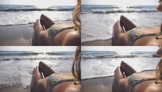 性感女孩躺在沙滩上高清在线视频素材下载