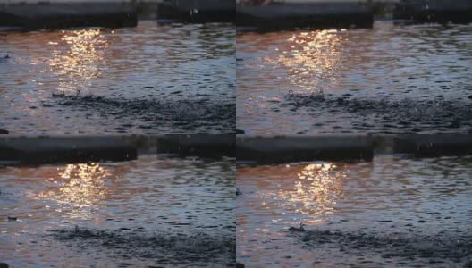 水滴从喷泉中落下的慢动作镜头高清在线视频素材下载