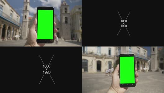 Walking with Green Screen Smartphone in Plaza de la Catedral高清在线视频素材下载