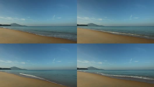 热带安达曼海景美丽的泰国普吉岛mai khao海滩与海浪冲击沙滩高清在线视频素材下载