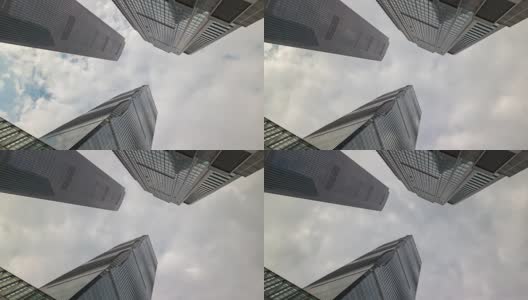 阳光明媚的一天，广州市中心的摩天大楼向上看4k时间流逝中国高清在线视频素材下载