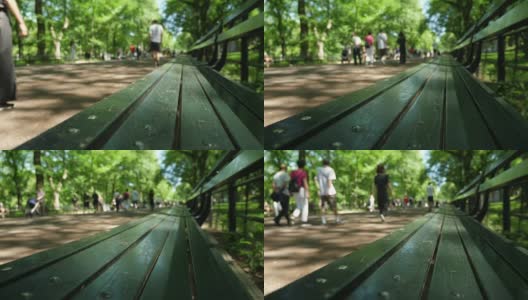 缓慢的多莉建立拍摄的绿色长凳在中央公园高清在线视频素材下载