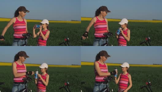 骑自行车的人喝水高清在线视频素材下载