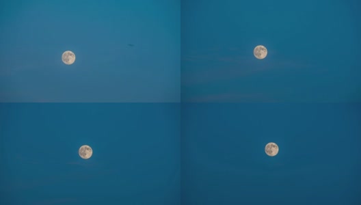 日落时月亮在天空中移动高清在线视频素材下载