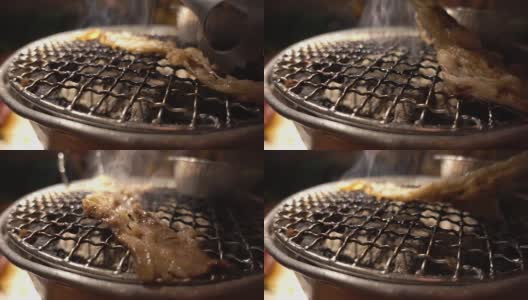 慢镜头的韩国烧烤牛肉在烧烤餐厅高清在线视频素材下载