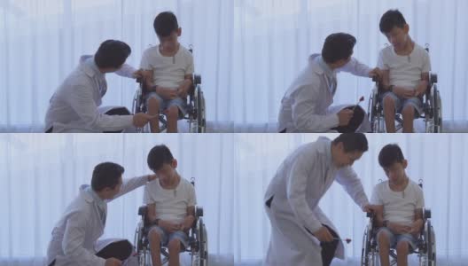 自闭症儿童，腿部残疾，坐在轮椅上，根据医院预约就诊高清在线视频素材下载