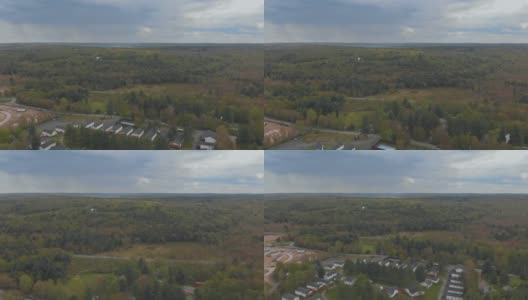 空中全景美丽的绿色覆盖森林在波科诺斯山在美国宾夕法尼亚州高清在线视频素材下载