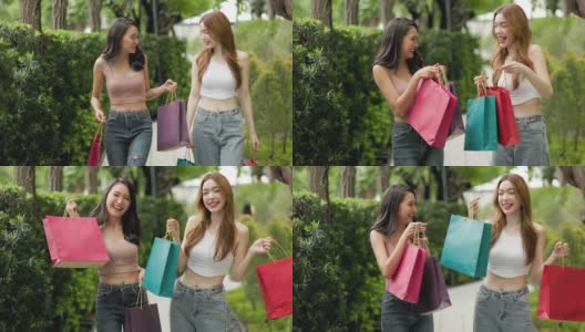 新常态购物，亚洲女人在服装店购物。高清在线视频素材下载