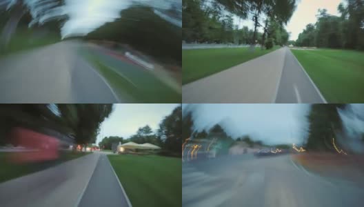 黄昏时分在城市公园出口处骑自行车的时间高清在线视频素材下载