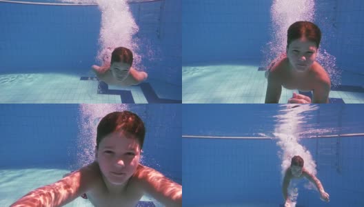 男孩在游泳池里跳水高清在线视频素材下载