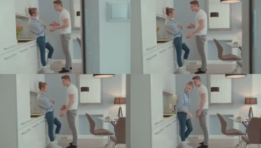 一对迷人的年轻夫妇在厨房吵架。高清在线视频素材下载