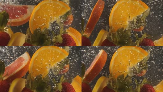 新鲜成熟的浆果和水果落入矿泉水，慢动作高清在线视频素材下载