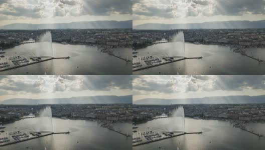 阳光明媚的一天日内瓦湖畔著名的喷泉城市景观空中全景4k时间流逝瑞士高清在线视频素材下载