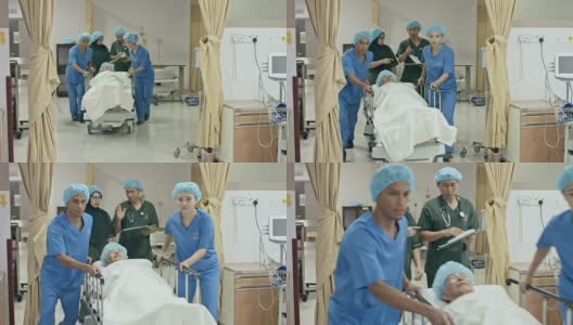 亚洲医疗队推着病床穿过走廊来到手术室高清在线视频素材下载