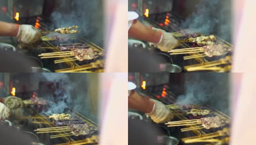 慢镜头烹饪烤肉串在中国餐馆。高清在线视频素材下载
