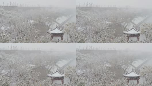 西安古城墙在雪中，中国。高清在线视频素材下载