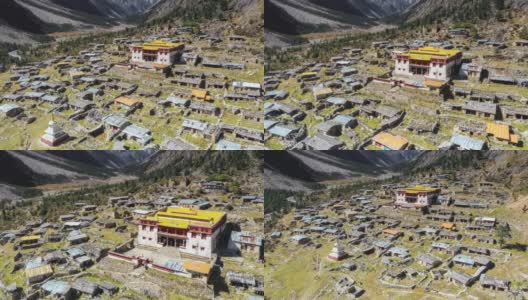 一座古老的藏传佛教寺庙矗立在群山和山谷之间高清在线视频素材下载
