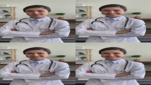 垂直视频微笑着穿着白色制服的印度女治疗师高清在线视频素材下载