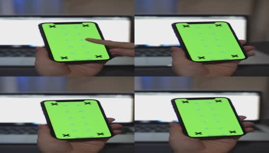 使用智能手机显示绿色屏幕高清在线视频素材下载