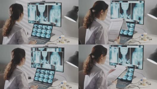 医生工作与X射线图像计算机高清在线视频素材下载