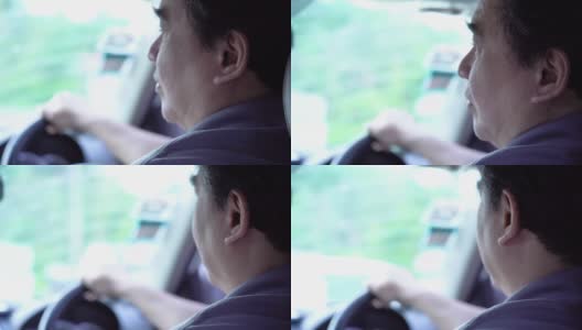 男人在开车时照镜子高清在线视频素材下载