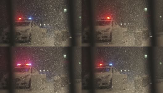 警车停在城市暴风雪中高清在线视频素材下载