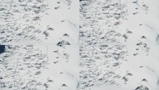 滑雪者在雪山上行走4k高清在线视频素材下载
