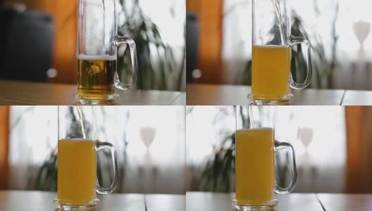 啤酒倒在桌子上的半空杯子里高清在线视频素材下载