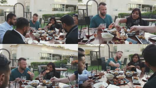 周五，朋友们在迪拜的一家屋顶餐厅吃早午餐高清在线视频素材下载
