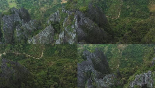 从上面俯瞰，Vang Vieng一组令人惊叹的石灰岩山脉。万荣是老挝万象省的一个旅游小镇。高清在线视频素材下载