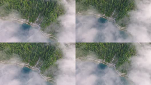 无人机电影日出场景与晨雾环绕Gosauseen湖，壮丽的奥地利阿尔卑斯山，上奥地利，欧洲高清在线视频素材下载