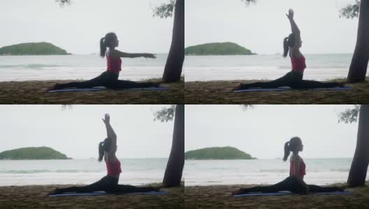 亚洲女性看海练练瑜伽，在沙滩上冥想灵活平衡，健康积极的生活方式理念高清在线视频素材下载
