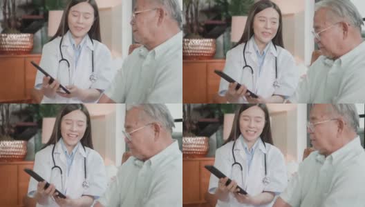 护士拿着药片和老年人谈论药物。高清在线视频素材下载
