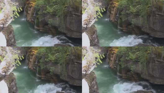 高流量从洞穴进入河流峡谷高清在线视频素材下载