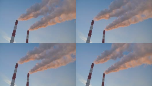 工厂的大烟囱排放出的烟雾对天空造成了环境污染高清在线视频素材下载