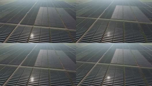 无人机飞越太阳能发电厂数千块太阳能电池板阵列高清在线视频素材下载