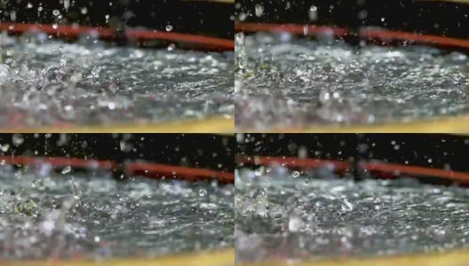 喷泉水在花园/泰国喷溅的超慢动作高清在线视频素材下载