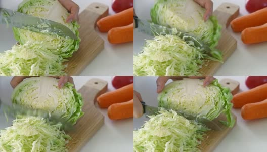 高丽菜沙拉沙拉。在木板上切白菜。高清在线视频素材下载