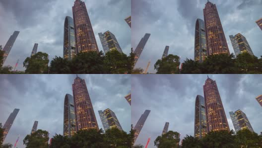 多云的夜晚，广州市中心著名建筑上的全景4k时间流逝中国高清在线视频素材下载