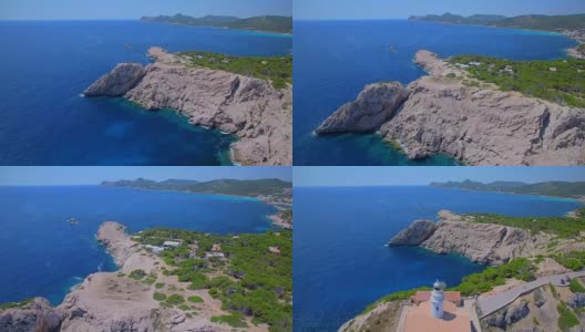 灯塔的Arial View - Far de Capdepera and rocky coast西班牙巴利阿里岛的马略卡岛/西班牙东北部海岸高清在线视频素材下载