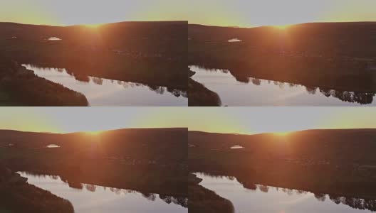 在日落的水库，西约克郡，英格兰-无人机拍摄高清在线视频素材下载