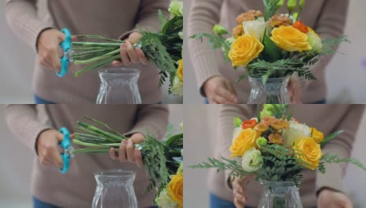 花商选择，挑选，调整鲜花，使之成为一束高清在线视频素材下载