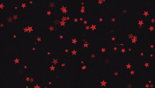4K抽象可循环飞行的红星，黑色背景高清在线视频素材下载