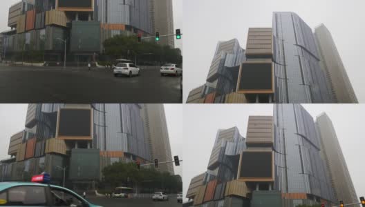 雨天长沙市区交通十字路口慢镜头全景4k中国高清在线视频素材下载