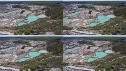 高岭土坑内有小绿松石采石场湖，鸟瞰图高清在线视频素材下载