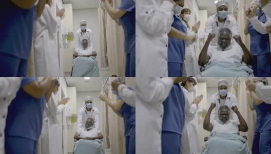 医生和护士庆祝老人康复出院高清在线视频素材下载