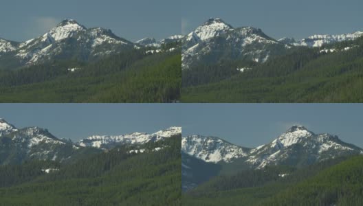 蒙大拿州博兹曼附近的加勒廷山脉，春雪在山峰上徘徊高清在线视频素材下载