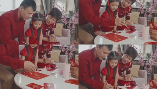 中国三口之家制作农历新年明信片高清在线视频素材下载