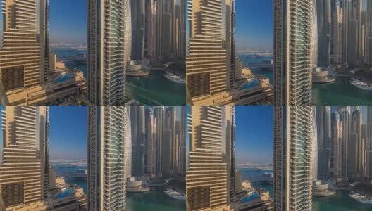 在阿联酋迪拜的迪拜码头，现代摩天大楼在日出的灯光下闪闪发光高清在线视频素材下载
